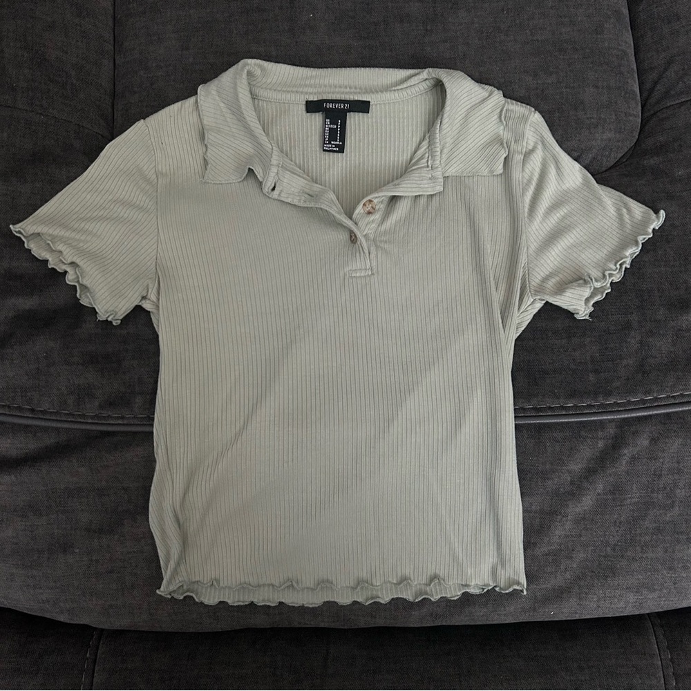 Ribbed sage green quarter button up blouse with lettuce trim